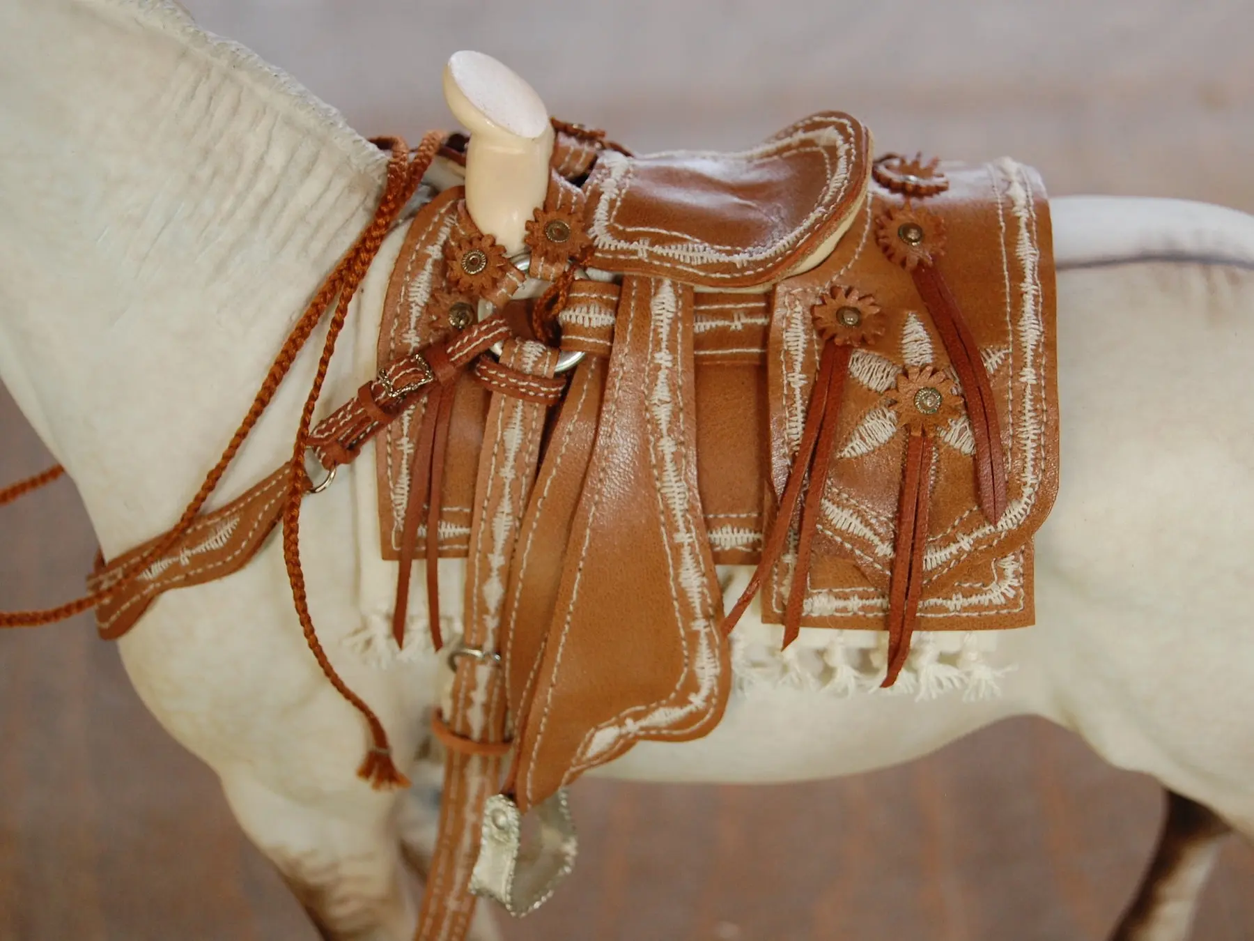 Model horse with miniature tack