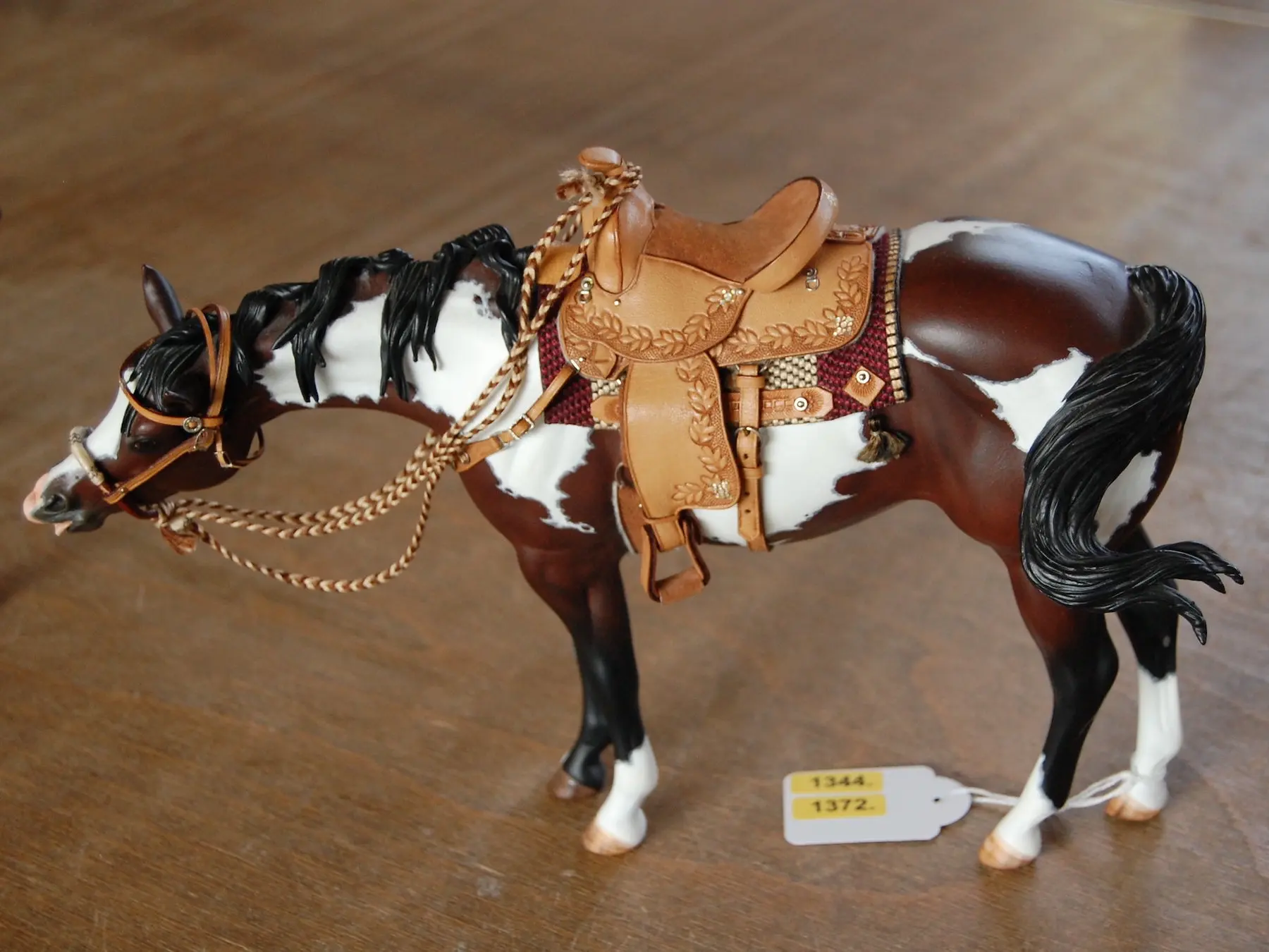 Model horse with miniature tack