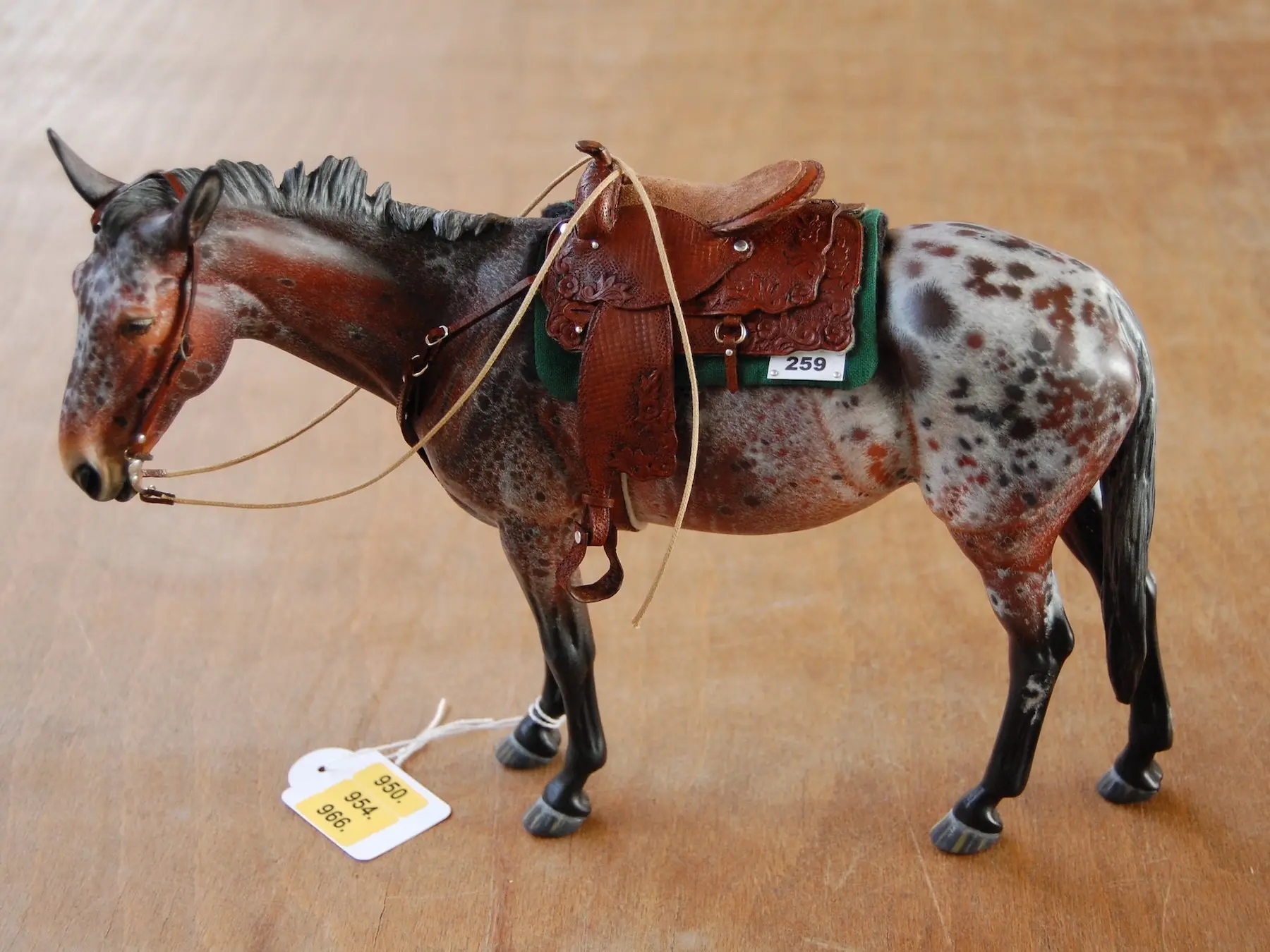 Model horse with miniature tack