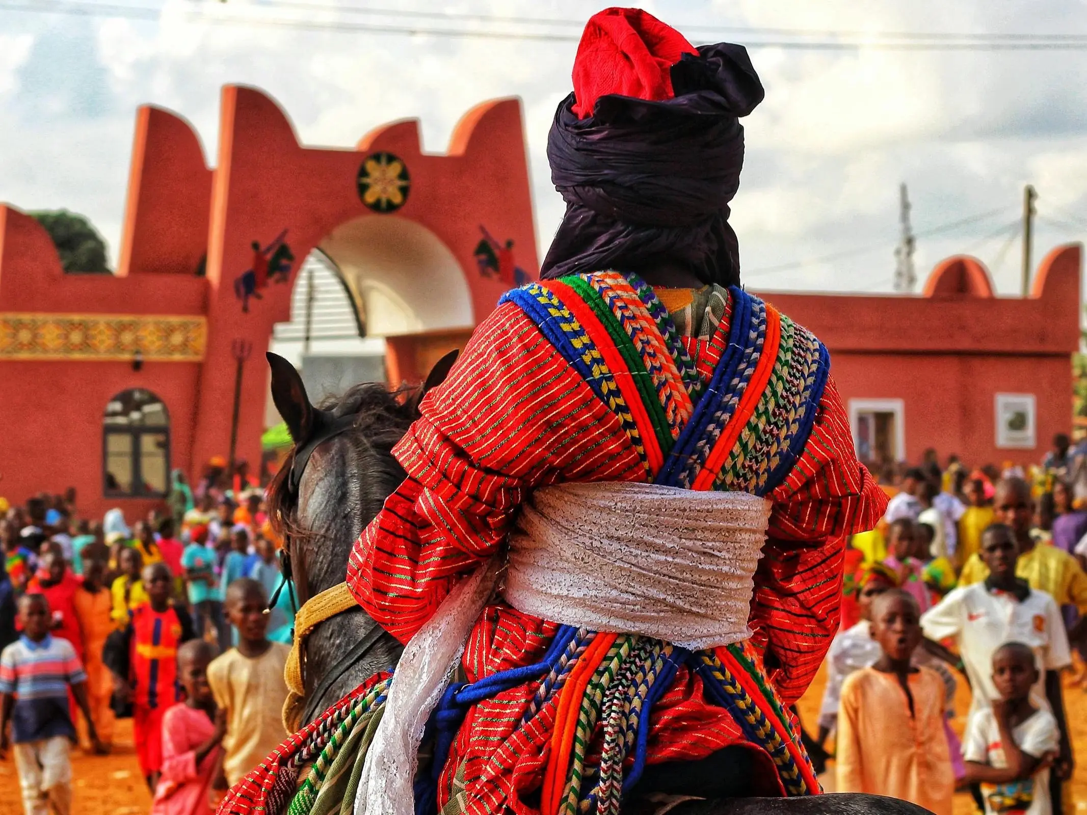 Nigerian man on a horse