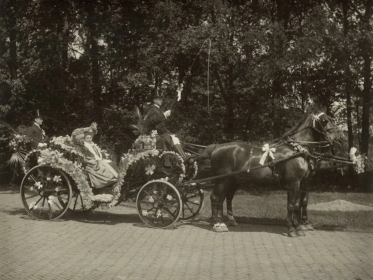 Horse team pulling a carriage with flowers