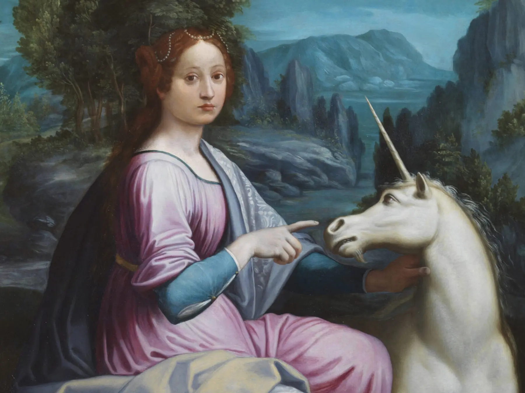 Painting of a woman with a unicorn